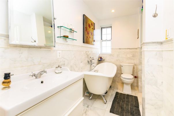 Bathroom, Dual Sink Vanities, Free Standing Baths, Interior, Marble, Marble Walls, Recessed Lighting