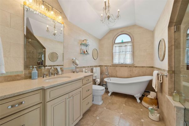 Bathroom, Chandelier, Dual Sink Vanities, Free Standing Baths, Glass Shower, Interior