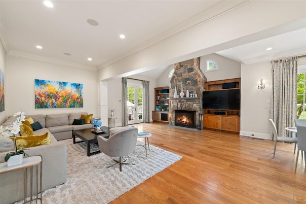Fireplace, Interior, Living room, Recessed Lighting, Stone Walls, Wood Texture Flooring