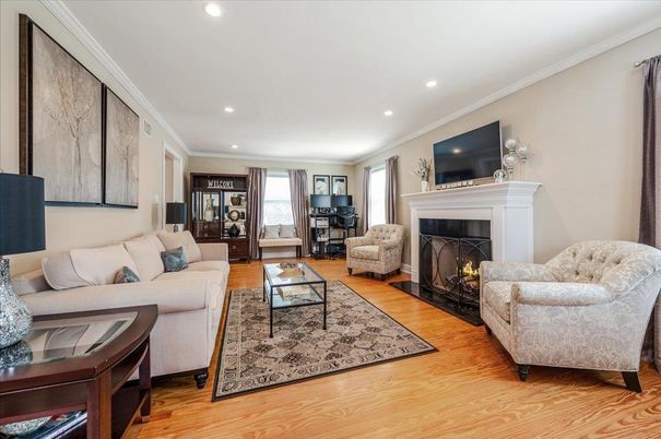 Fireplace, Interior, Living room, Piano, Recessed Lighting, Wood Texture Flooring