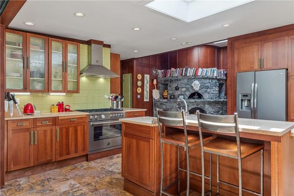 Fireplace, Interior, Kitchen, Recessed Lighting, Stainless Steel Appliances, Stone Walls