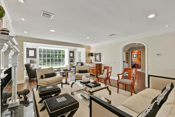 Dining room, Fireplace, Interior, Living room, Recessed Lighting, Wood Texture Flooring