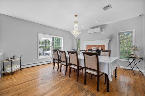 Chandelier, Dining room, Fireplace, Interior, Recessed Lighting, Wood Texture Flooring