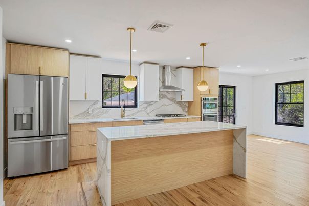 Interior, Kitchen, Marble Walls, Pendant Lights, Recessed Lighting, Stainless Steel Appliances, Wood Texture Flooring
