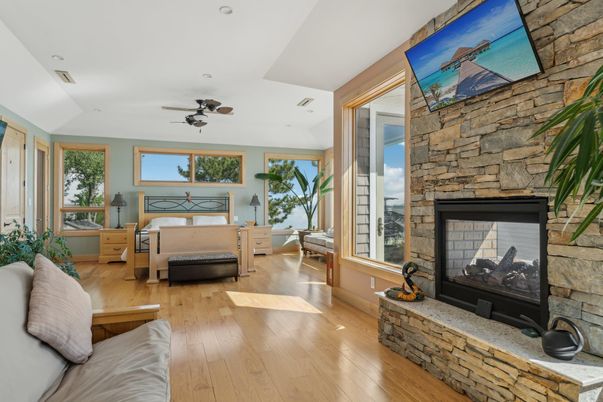 Bedroom, Fireplace, Interior, Recessed Lighting, Stone Walls, Wood Texture Flooring