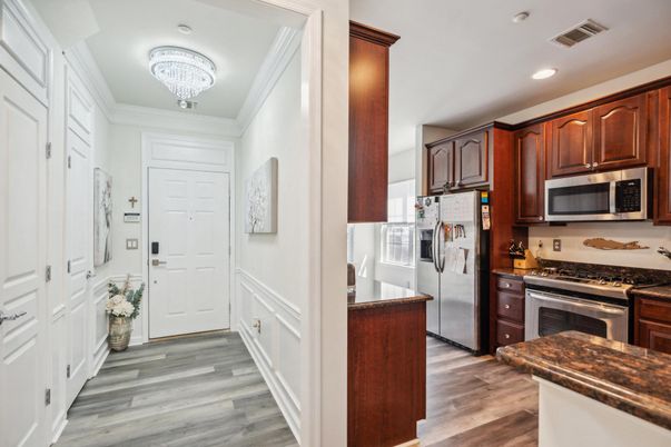 Chandelier, Interior, Kitchen, Recessed Lighting, Stainless Steel Appliances, Wood Texture Flooring