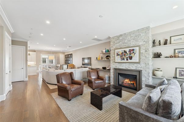 Fireplace, Interior, Living room, Recessed Lighting, Stone Walls, Wood Texture Flooring