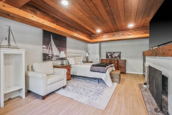 Bedroom, Fireplace, Interior, Recessed Lighting, Wooden Ceilings, Wood Texture Flooring