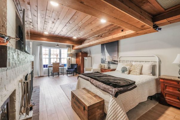 Bedroom, Fireplace, Interior, Living room, Recessed Lighting, Wooden Beams, Wooden Ceilings, Wood Texture Flooring
