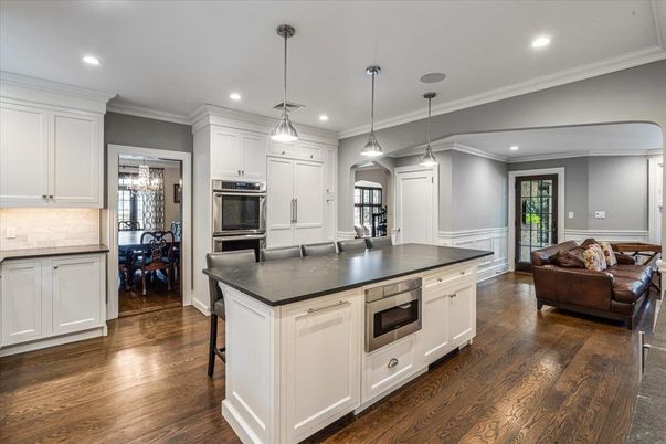 Dining room, Interior, Kitchen, Pendant Lights, Recessed Lighting, Stainless Steel Appliances, Wood Texture Flooring