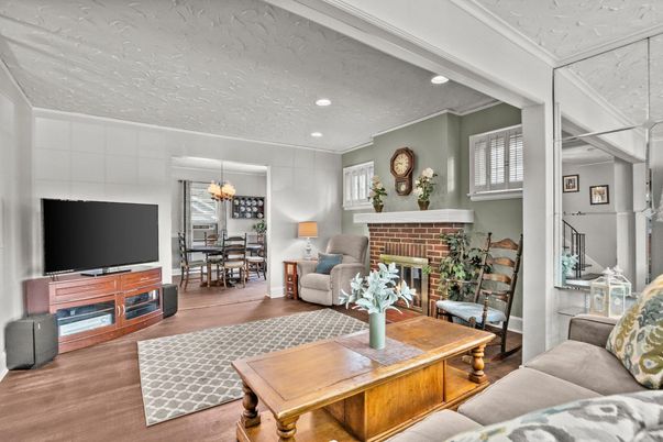Chandelier, Dining room, Fireplace, Interior, Living room, Recessed Lighting, Wood Texture Flooring