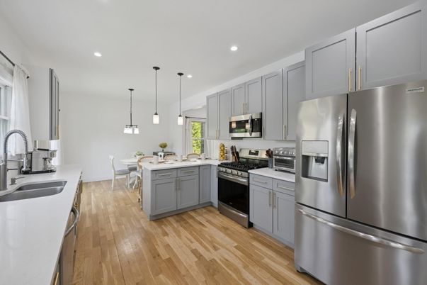 Dining room, Interior, Kitchen, Pendant Lights, Recessed Lighting, Stainless Steel Appliances, Wood Texture Flooring