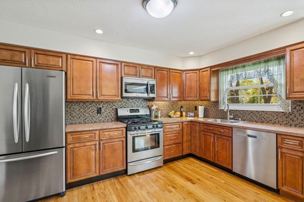 Interior, Kitchen, Recessed Lighting, Stainless Steel Appliances, Wood Texture Flooring