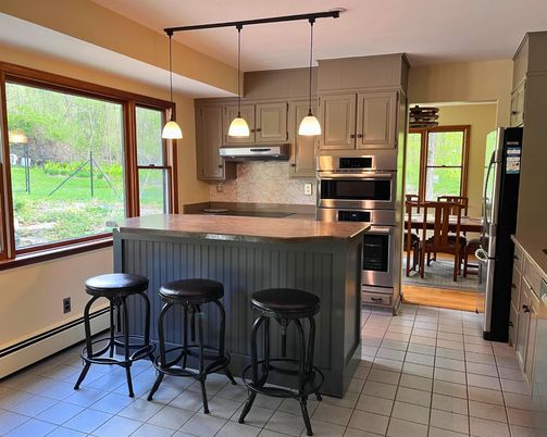 Dining room, Interior, Kitchen, Pendant Lights, Stainless Steel Appliances, Wood Texture Flooring