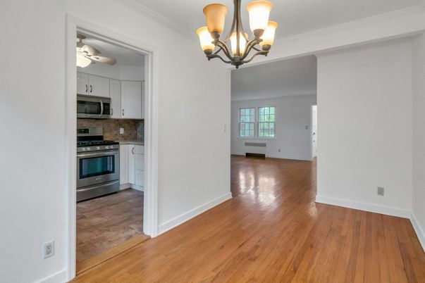 Chandelier, Empty room, Interior, Kitchen, Stainless Steel Appliances, Wood Texture Flooring