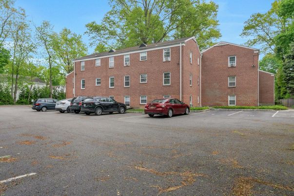 Exterior, Facade, Brick Facade, Condo Building