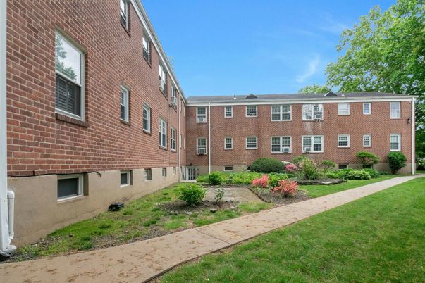 Exterior, Facade, Brick Facade, Condo Building
