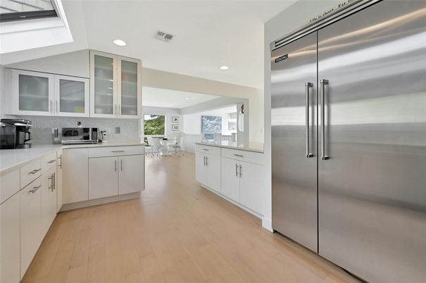 Dining room, Interior, Kitchen, Recessed Lighting, Stainless Steel Appliances, Wood Texture Flooring