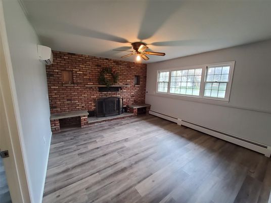 Empty room, Fireplace, Interior, Stone Walls, Wood Texture Flooring