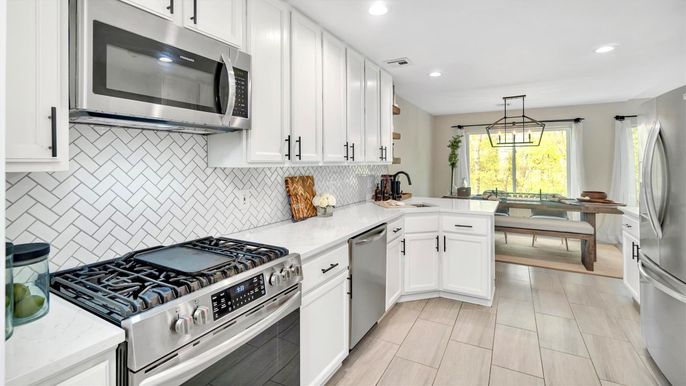 Dining room, Interior, Kitchen, Pendant Lights, Recessed Lighting, Stainless Steel Appliances, Wood Texture Flooring