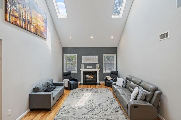 Fireplace, Interior, Living room, Recessed Lighting, Wood Texture Flooring