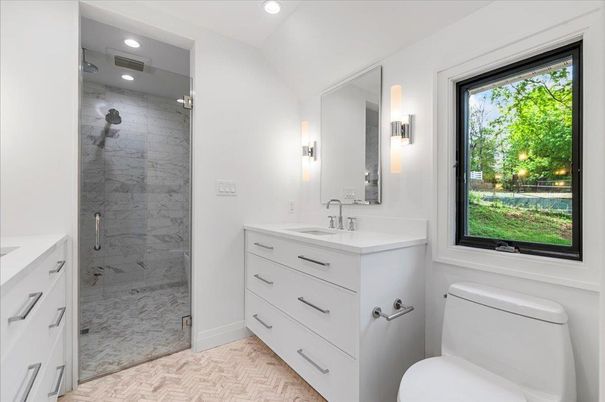 Bathroom, Dual Sink Vanities, Glass Shower, Interior, Marble, Marble Walls, Recessed Lighting