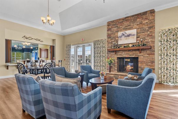 Chandelier, Dining room, Fireplace, Interior, Living room, Stone Walls, Wood Texture Flooring