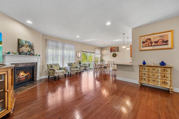 Dining room, Fireplace, Interior, Living room, Pendant Lights, Recessed Lighting, Wood Texture Flooring