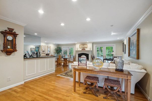 Dining room, Fireplace, Interior, Living room, Recessed Lighting, Wood Texture Flooring