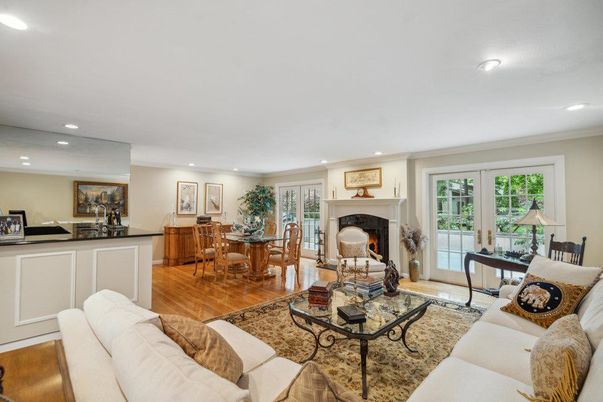 Dining room, Fireplace, Interior, Living room, Recessed Lighting, Wood Texture Flooring