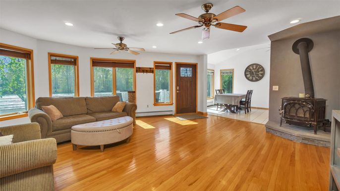 Dining room, Fireplace, Interior, Living room, Recessed Lighting, Wood Texture Flooring