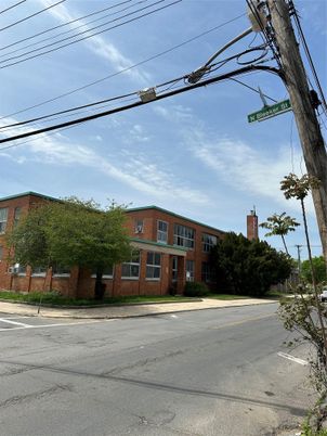 Exterior, Facade, Brick Facade, Condo Building