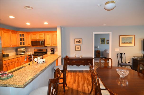 Dining room, Interior, Kitchen, Recessed Lighting, Stainless Steel Appliances, Wood Texture Flooring