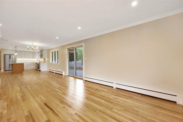 Chandelier, Empty room, Interior, Kitchen, Recessed Lighting, Stainless Steel Appliances, Wood Texture Flooring