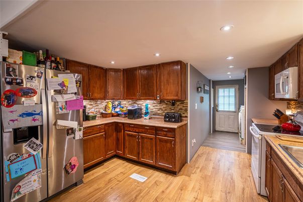 Interior, Kitchen, Recessed Lighting, Stainless Steel Appliances, Wood Texture Flooring