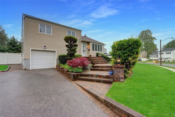 Attached, Exterior, Facade, Raised Ranch