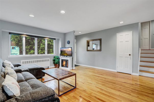 Fireplace, Interior, Living room, Recessed Lighting, Wood Texture Flooring