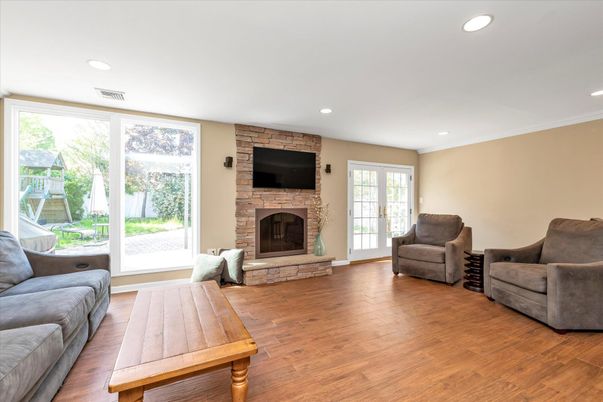Fireplace, Interior, Recessed Lighting, Stone Walls, Wood Texture Flooring
