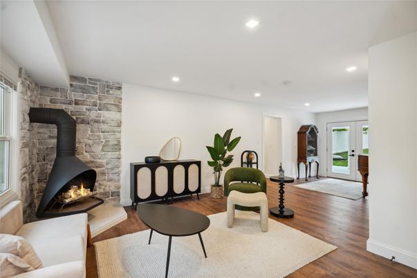 Fireplace, Interior, Recessed Lighting, Stone Walls, Wood Texture Flooring