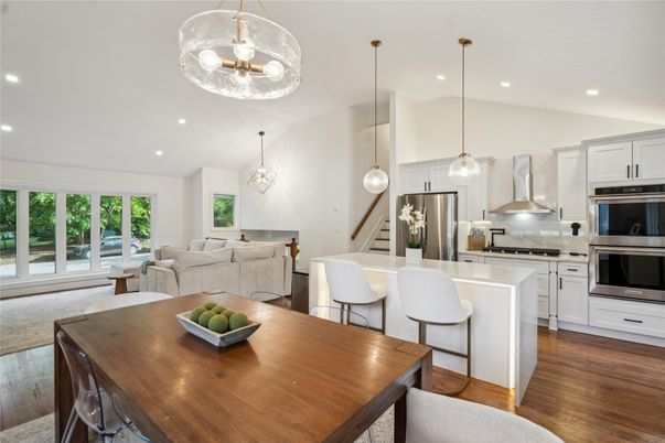 Dining room, Interior, Kitchen, Living room, Pendant Lights, Recessed Lighting, Stainless Steel Appliances, Wood Texture Flooring