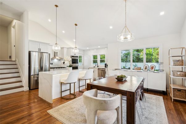 Dining room, Interior, Kitchen, Pendant Lights, Recessed Lighting, Stainless Steel Appliances, Wood Texture Flooring