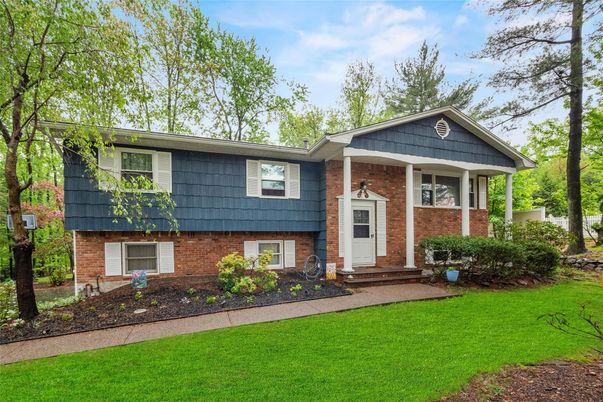 Exterior, Facade, Brick Facade, Raised Ranch