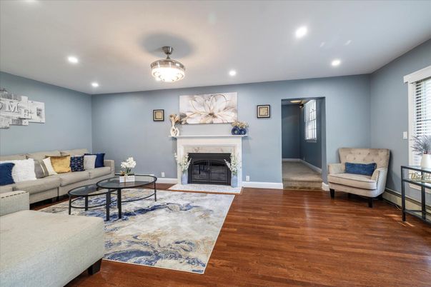 Fireplace, Interior, Living room, Recessed Lighting, Wood Texture Flooring