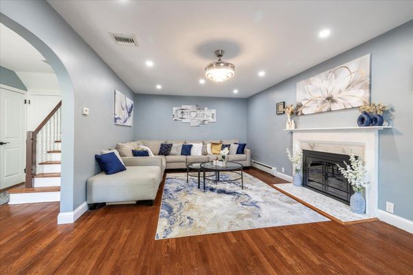 Fireplace, Interior, Living room, Recessed Lighting, Wood Texture Flooring