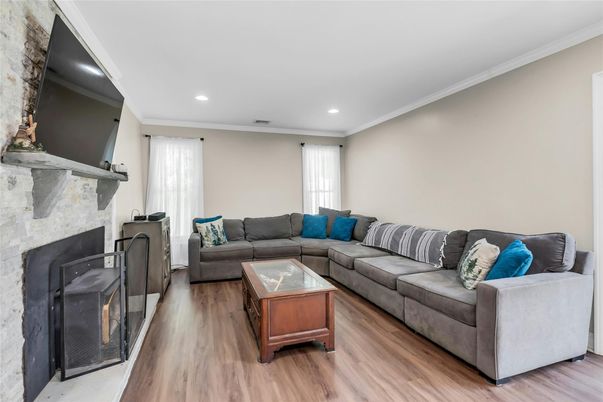 Fireplace, Interior, Living room, Recessed Lighting, Wood Texture Flooring