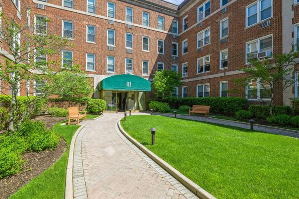 Exterior, Facade, Brick Facade, Condo Building