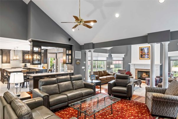 Dining room, Fireplace, Interior, Living room, Pendant Lights, Recessed Lighting, Wood Texture Flooring
