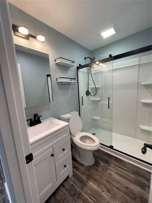 Bathroom, Glass Shower, Interior, Recessed Lighting, Wood Texture Flooring