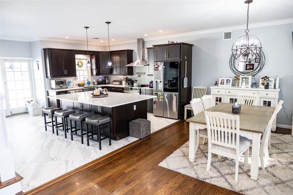 Dining room, Interior, Kitchen, Marble, Pendant Lights, Recessed Lighting, Stainless Steel Appliances, Wood Texture Flooring
