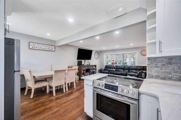 Dining room, Interior, Kitchen, Living room, Recessed Lighting, Stainless Steel Appliances, Wood Texture Flooring